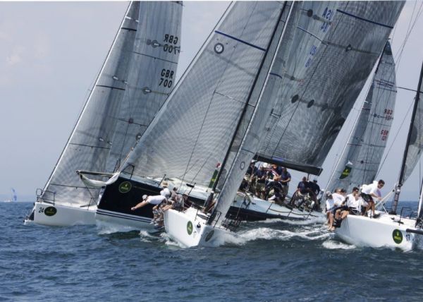 Bella Mente rounds the weather mark in a pack of Melges 32s - Photo ...