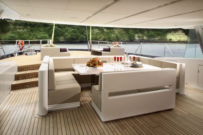 Sailing yacht RED DRAGON by Dubois - aft al fresco dining table