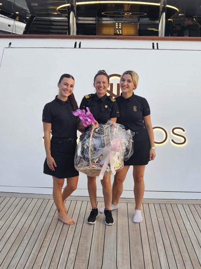 Stewardess of luxury yacht SCORPIOS - winners of the Table Scaping Competition at CROYA 2024